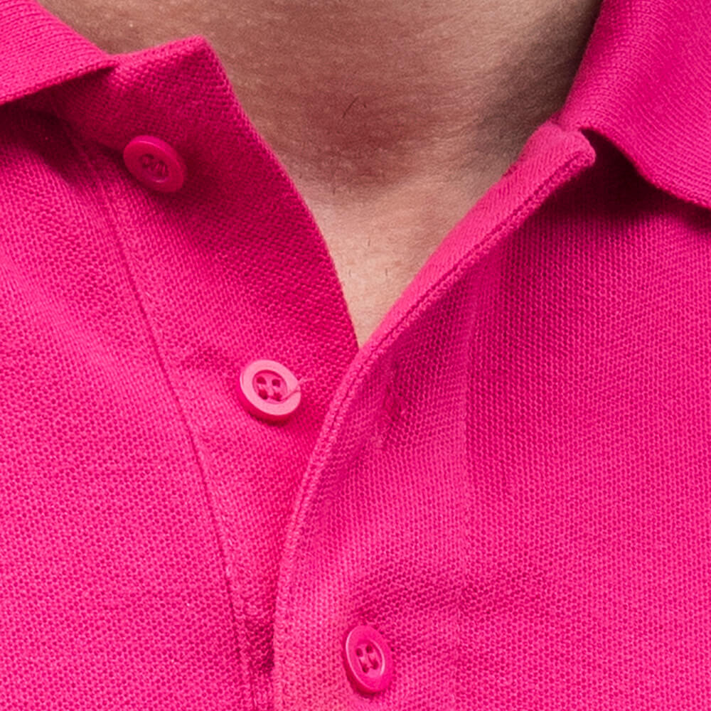 Close up of pink polo shirt