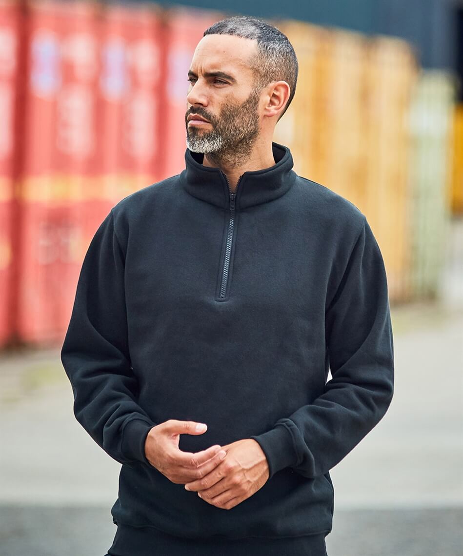 Man wearing 1/4 zip sweatshirt